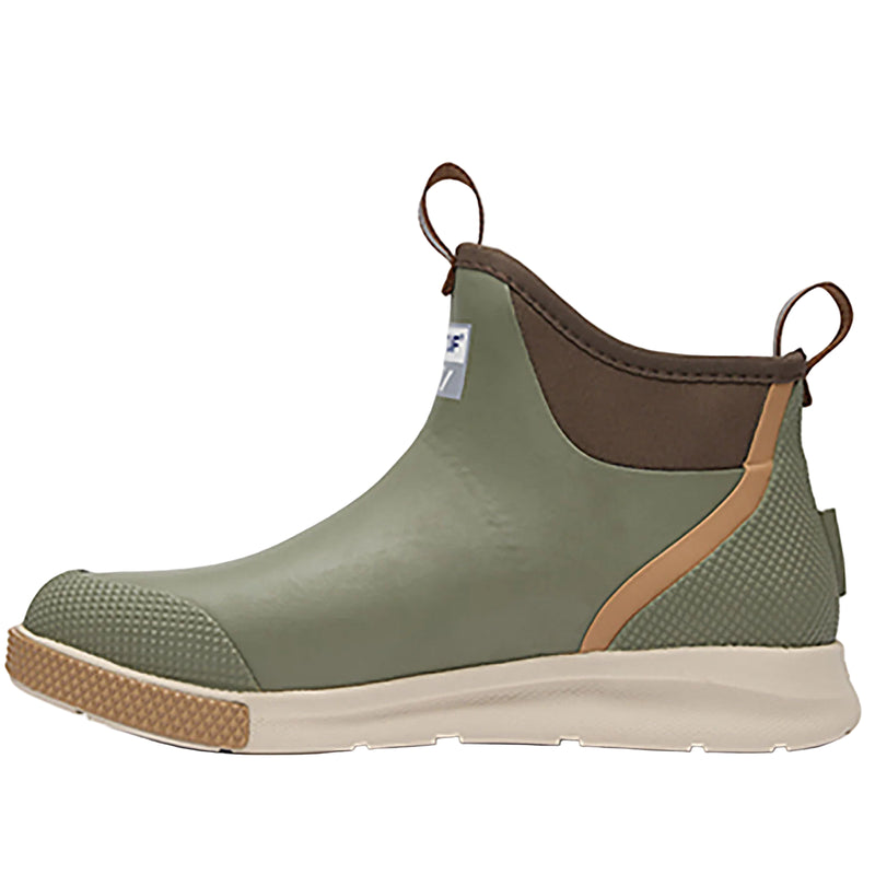 Green rubber boot with brown accents on a white background