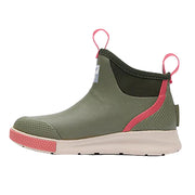 Green rubber boot with pink accents on a white background