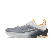 Side view of a grey hiking shoe with white and orange accents against a white background.