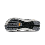 Bottom view of a hiking shoe with a black, grey, and white tread against a white background. 