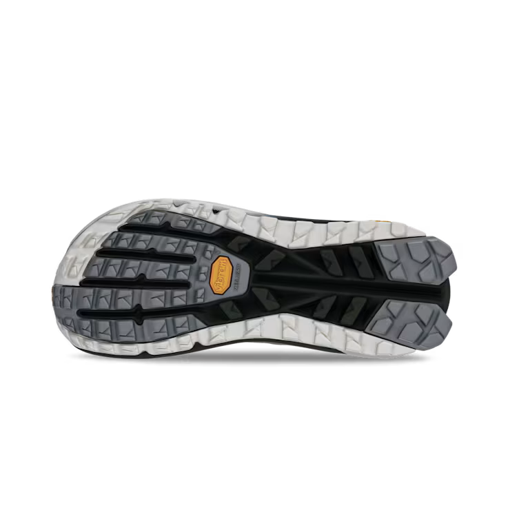 Bottom view of a hiking shoe with a black, grey, and white tread against a white background. 