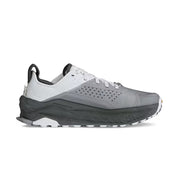Side view of a gray and white hiking shoe against a white background. 