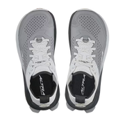 Top view of a pair of white and gray hiking shoes against a white background. 