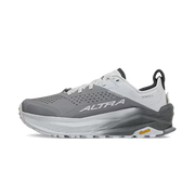 Side view of a gray and white hiking shoe against a white background.