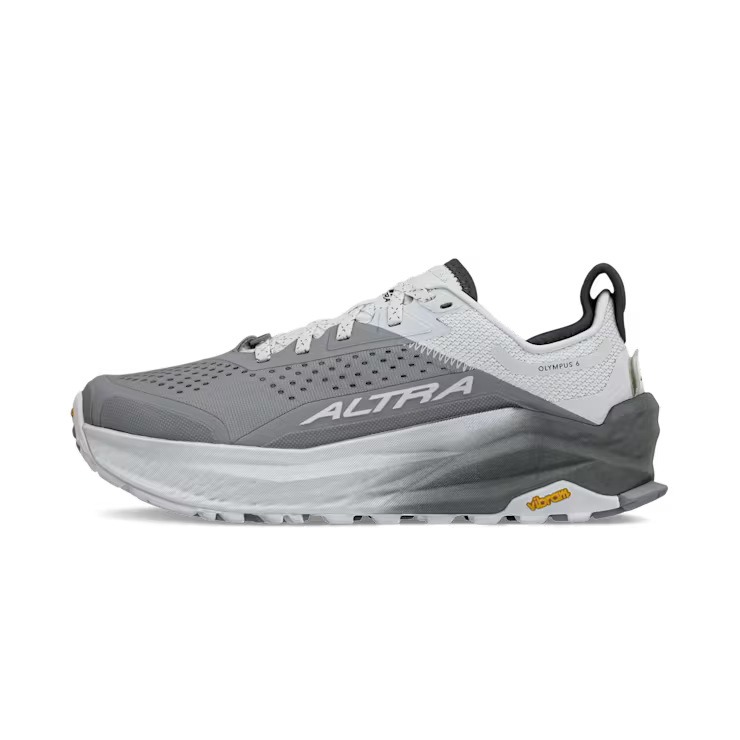 Side view of a gray and white hiking shoe against a white background.