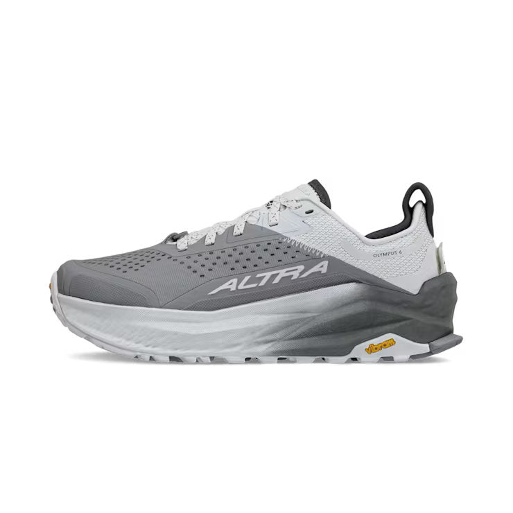 Side view of a gray and white hiking shoe against a white background.