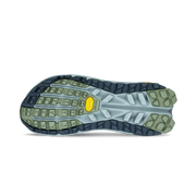 Close-up of a shoe sole with a textured pattern on a white background