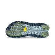 Close-up of a shoe sole with a textured pattern on a white background