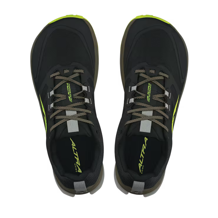 Top view of a pair of black hiking shoes with lime green accents against a white background.