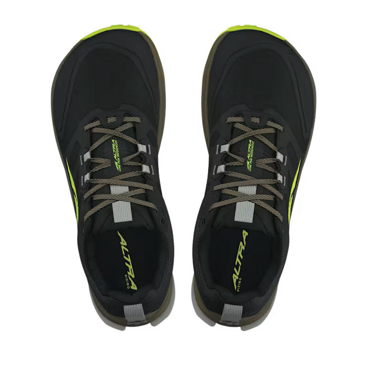 Top view of a pair of black hiking shoes with lime green accents against a white background.