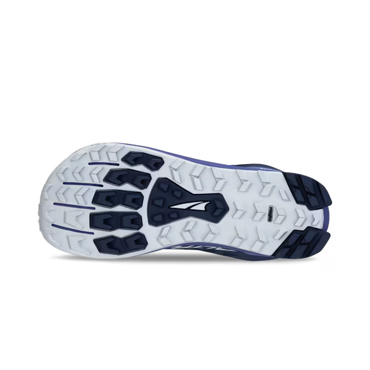 Bottom view of a blue hiking shoe showing a white and darker blue colored tread against a white background. 