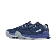 Side view of a pair of dark blue hiking shoes with .ight blue accents against a white background. 