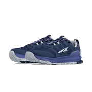 Side view of a pair of dark blue hiking shoes with .ight blue accents against a white background. 