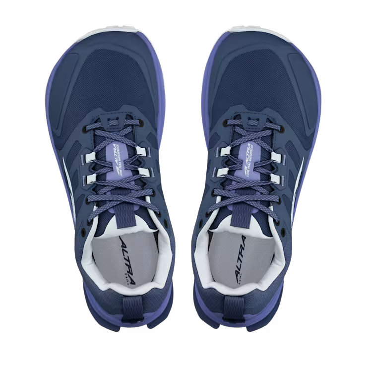 Top view of a pair of dark blue hiking shoes with light blue accents against a white background. 