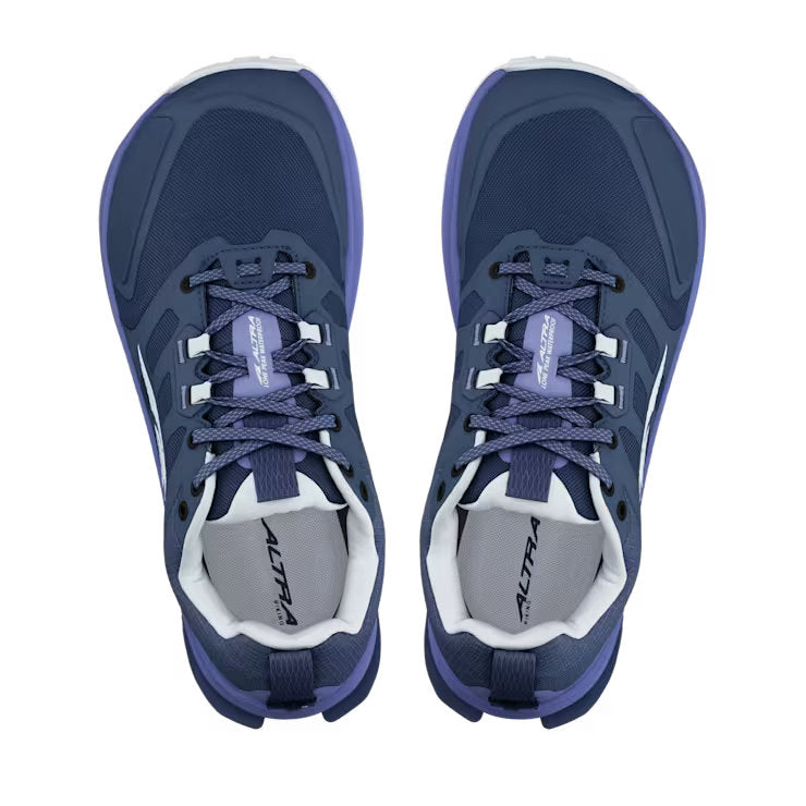 Top view of a pair of dark blue hiking shoes with light blue accents against a white background. 