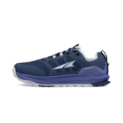 Side view of a dark blue hiking shoe with light blue accents against a white background. 