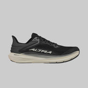 A black running shoe with a white bottom on a white background