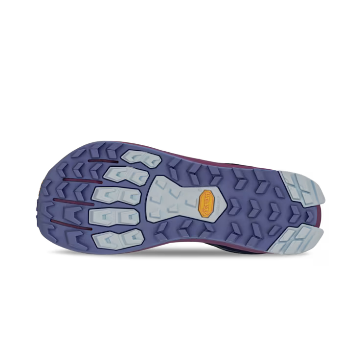 Bottom view of a navy and purple colored trail running shoe. The tread has a dark blue and light blue color to it against a white background. 