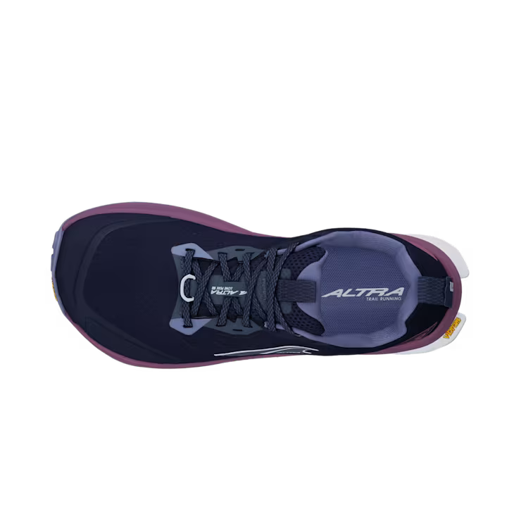 Top view of a navy blue colored trail running shoe with purple accents against a white background. 