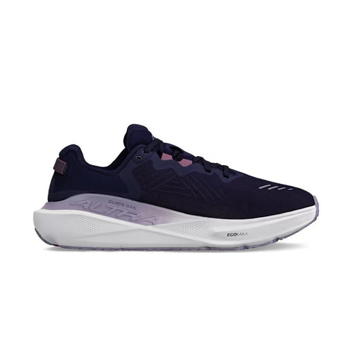 Side view of a navy blue trail running shoe with white accents against a white background. 
