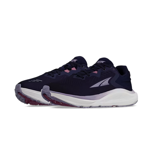 Side view of a pair of navy blue trail running shoes with white accents against a white background. 