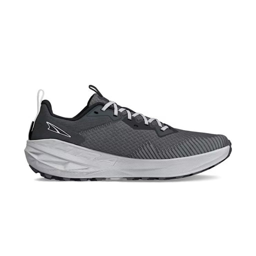 Side view of a gray trail running shoe with white laces against a white background. 
