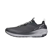 Side view of a gray trail running shoe against a white background. 