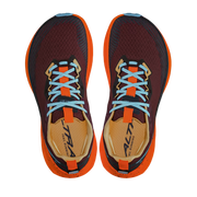 Top view of a pair of red shoes with orange accents and blue laces against a white background. 