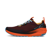 Side view of a red trail running shoe with bright orange accents and blue laces against a white background. 