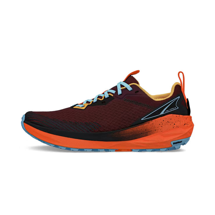 Side view of a red trail running shoe with bright orange accents and blue laces against a white background. 