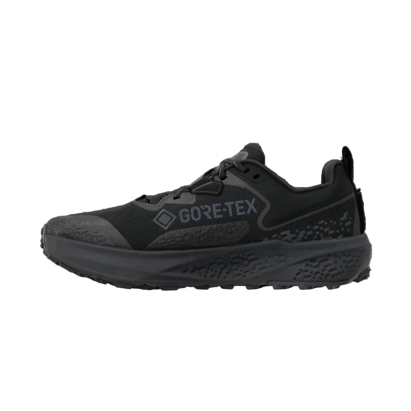 A black running shoe on a white background