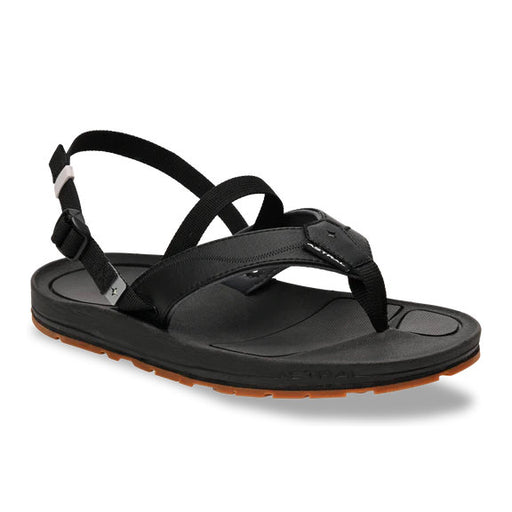 Side view of a black sandal with a brown tread against a white background. 