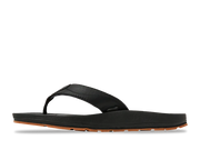 Side view of a black sandal against a white background. 