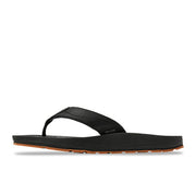 Side view of a black sandal against a white background. 