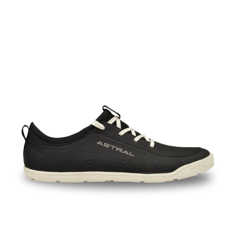 Black shoe with white laces and sole on a white background, featuring the brand 'Astral'.
