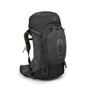 The back of a black hiking backpack on a white background