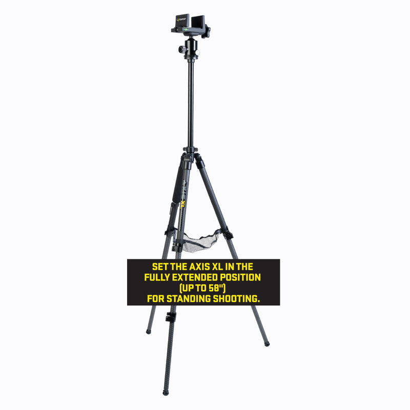 A black tripod standing on a white background with a black instruction label overlaid near the bottom. The label reads: 'SET THE AXIS XL IN THE FULLY EXTENDED POSITION (UP TO 56") FOR STANDING SHOOTING.