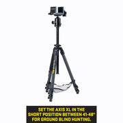 A black Axis XL tripod with a mounted mesh shelf shown on a white background with a black text banner at the bottom that reads: 'SET THE AXIS XL IN THE SHORT POSITION BETWEEN 41-48" FOR GROUND BLIND HUNTING.'.