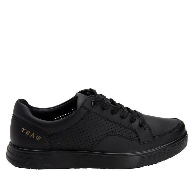 Side view of a completely black shoe against a white background. 