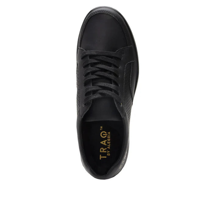 Top-down view of a completely black shoe against a white background.