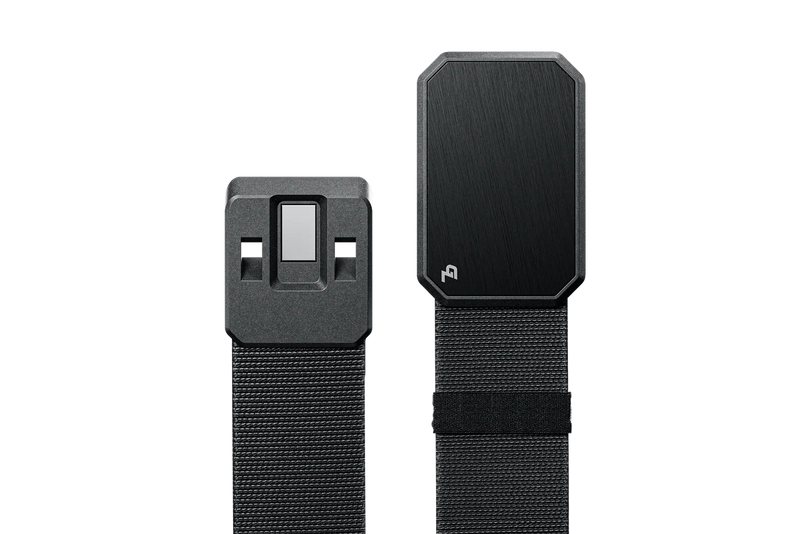 A black belt with a solid black buckle unbuckled