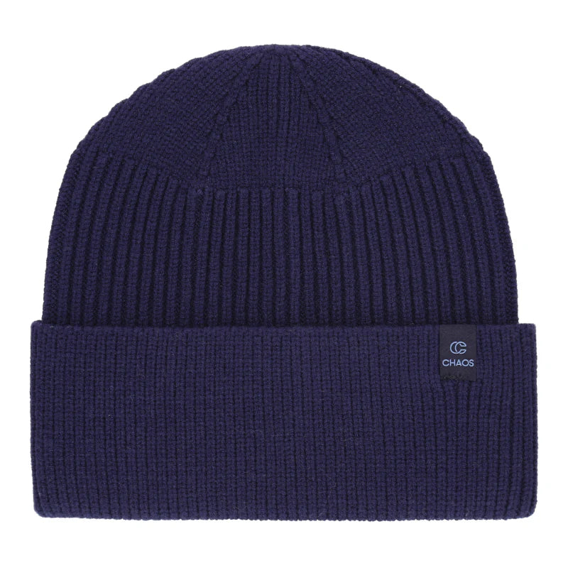 Navy blue knit beanie against a white background. 