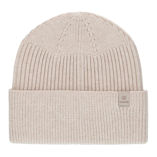 White knit beanie against a white background.