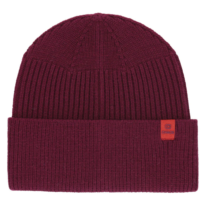 Wine red color knit beanie against a white background. 