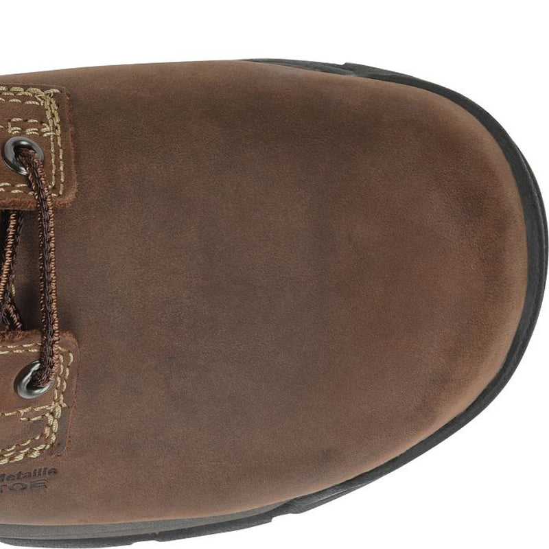 Close-up of a brown leather boot with visible stitching on a white background