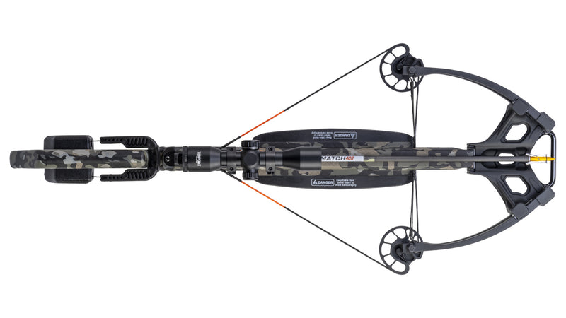 Top view of a black and grey camo crossbow on a white background.