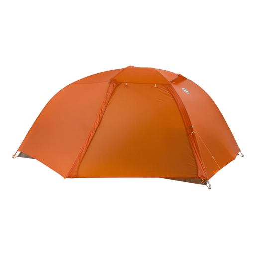 An orange tent from behind