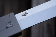 A close up on the logo on the blade of a pocket knife