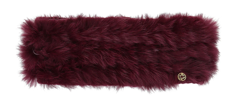 Wine red fuzzy headband against a white background. 
