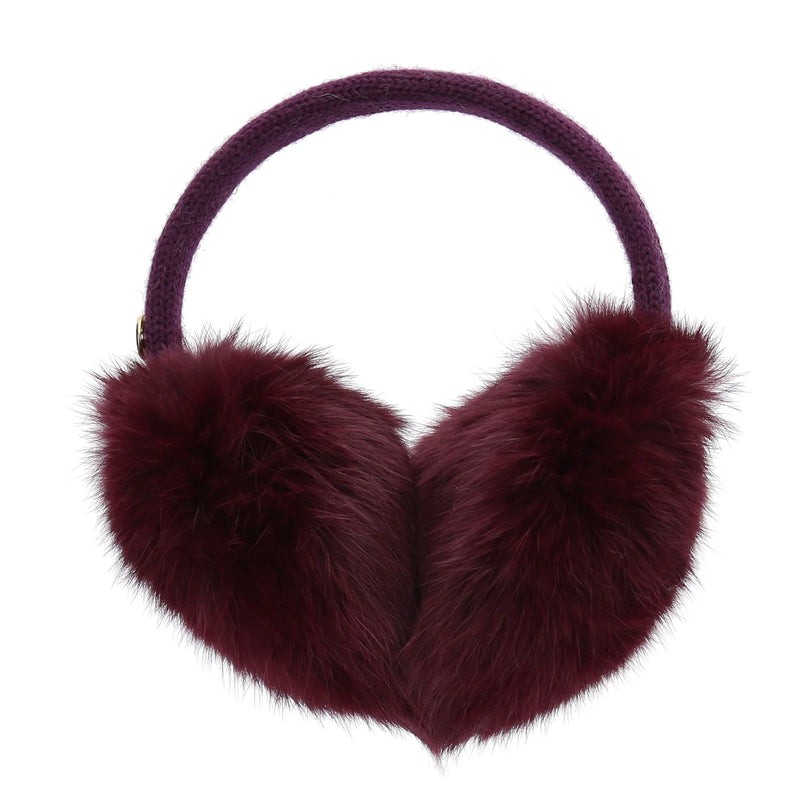 Wine red fuzzy earmuffs against a white background. 